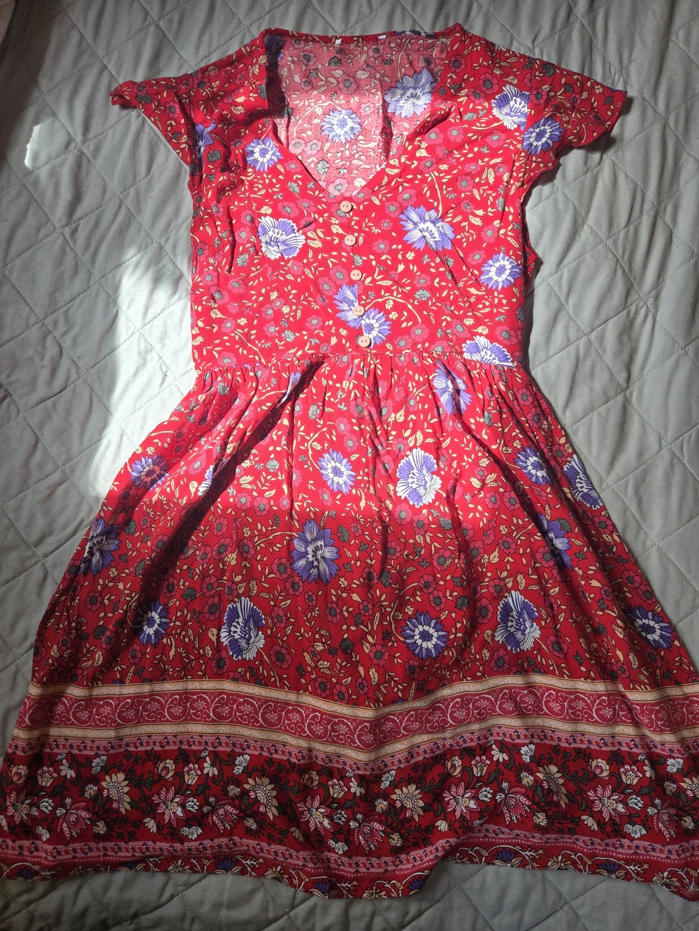 Red Floral V-Neck Mini Dress with Blue Accents Cinched Waist